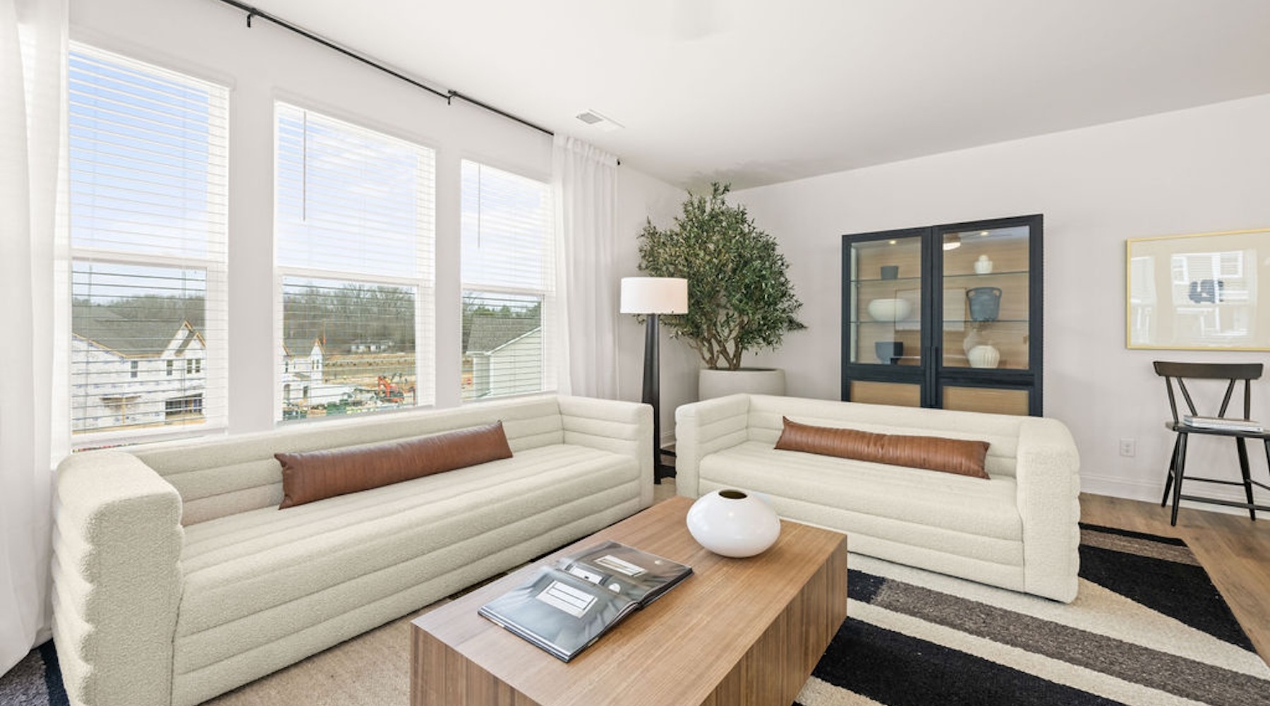living room with easy to access spaces and ample lighting