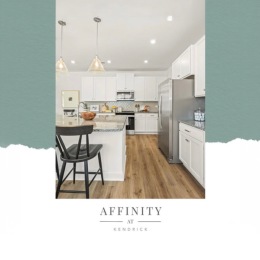 kitchen with ample counter-space, modern appliances and bright lighting